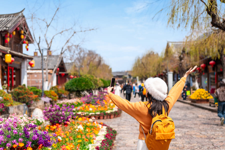 Turista disfrutando de Yunnan
